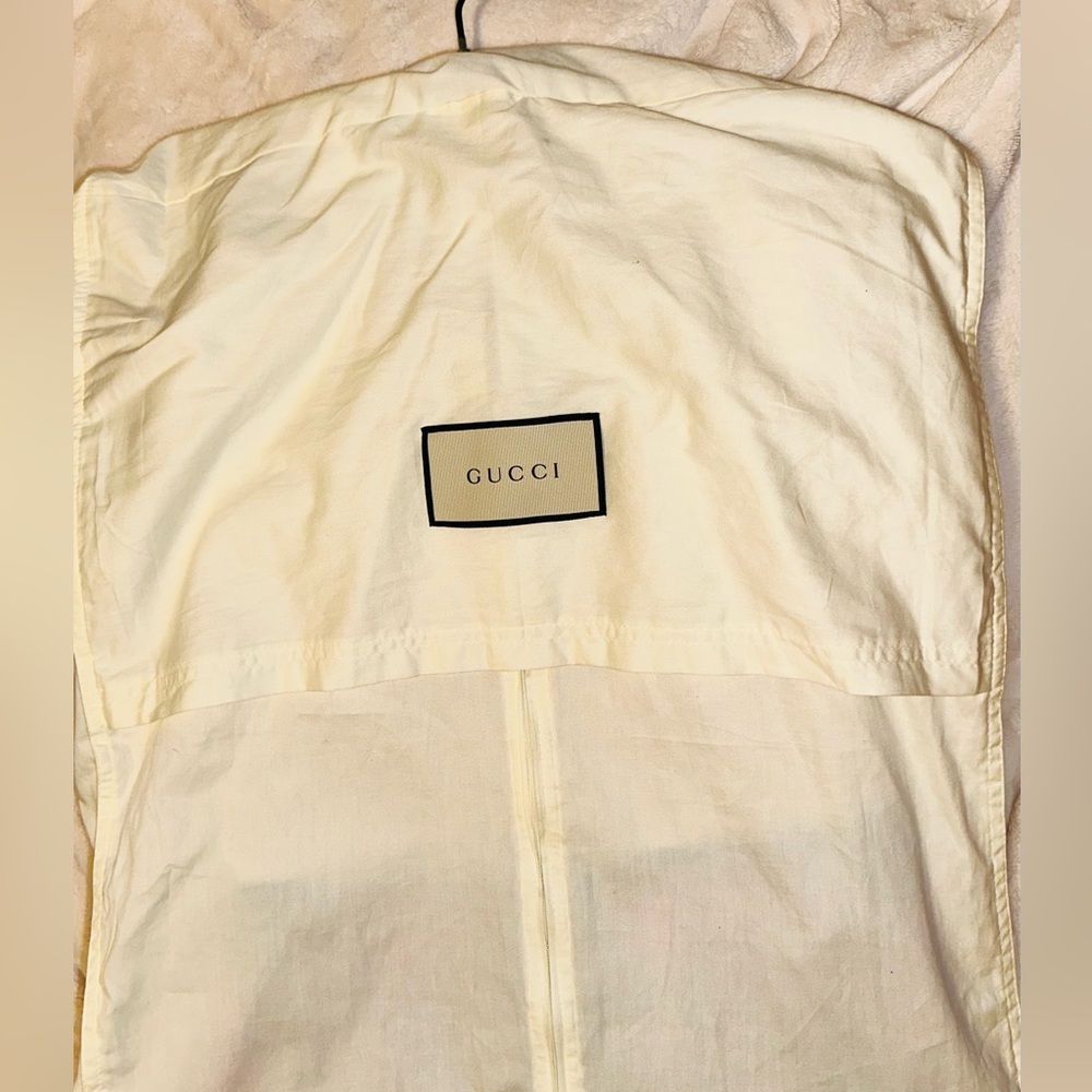 Gucci Red, Crème and Black Asymmetrical Dress with Gucci ivory dress cover. - Picture 8 of 15